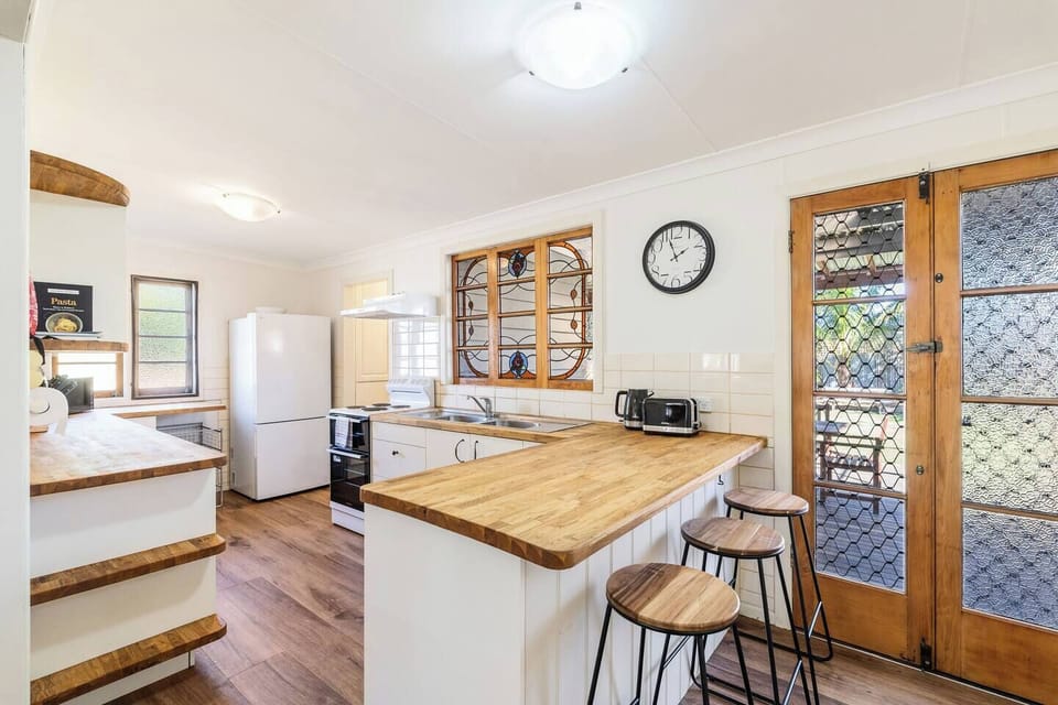 Pull up a stool at the timber breakfast bar while meals are prepared, or simply enjoy a wine and chat in the sociable kitchen area.