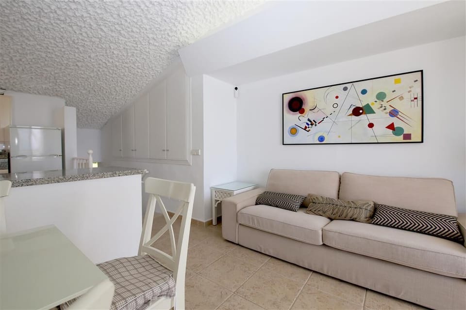 Another picture of the lounge with comfortable seating and air conditioning