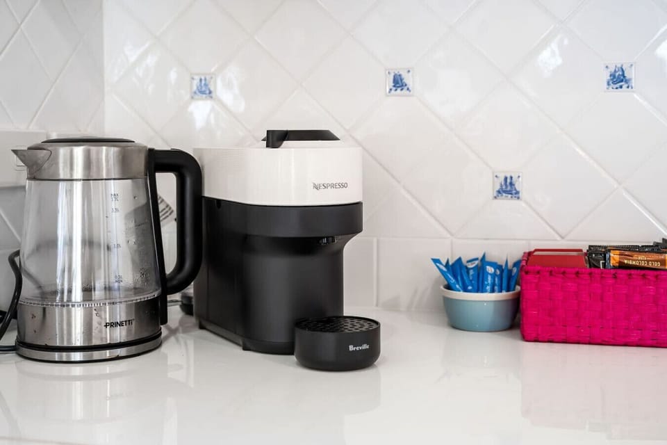 Coffee machine, kettle, and essentials ready for your morning pick-me-up.