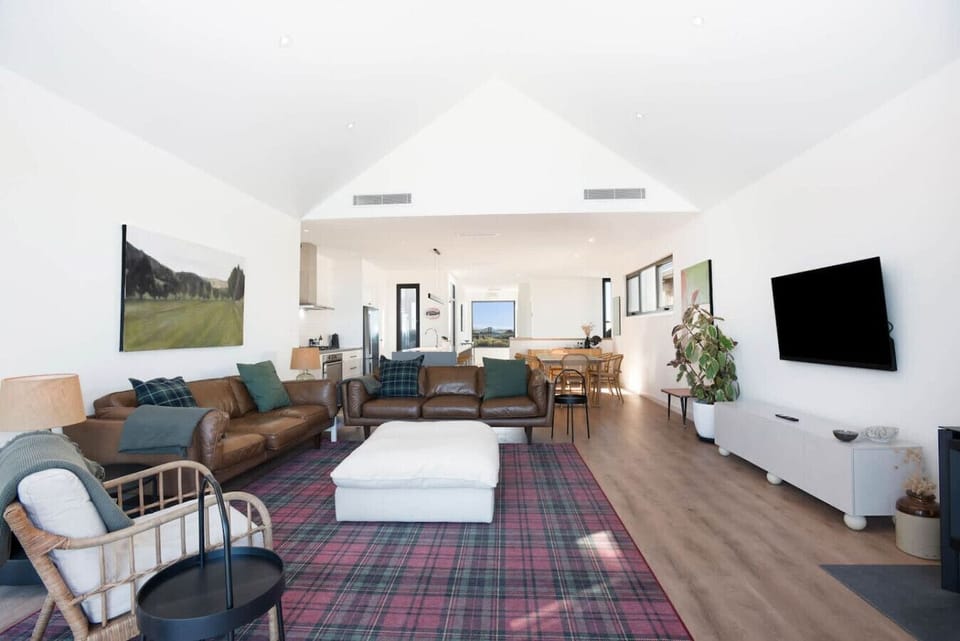 This open-plan living area is designed for shared time, with generous seating that makes it easy to relax together.