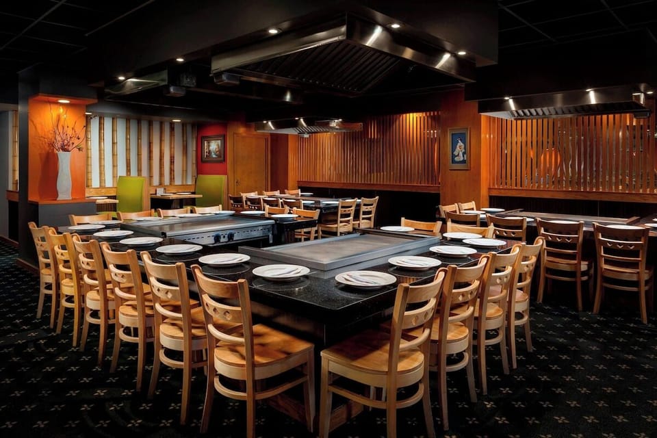 Gather for sizzling teppanyaki-style dinners in a warm, inviting room.