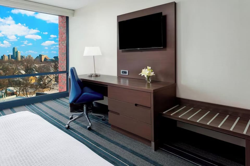 Settle in at the spacious desk and stream on the TV.