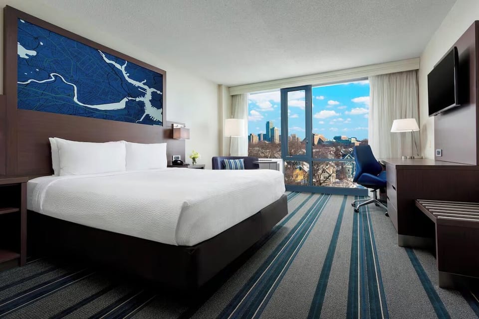 Relax in serene comfort with a big window and skyline.