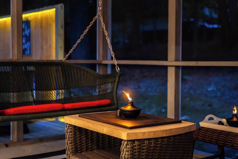 Screened in porch with dining for 8 plus additional comfy seating area