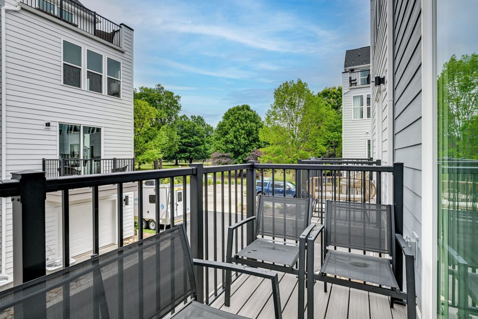 Townhome Exterior | Balcony w/ Seating