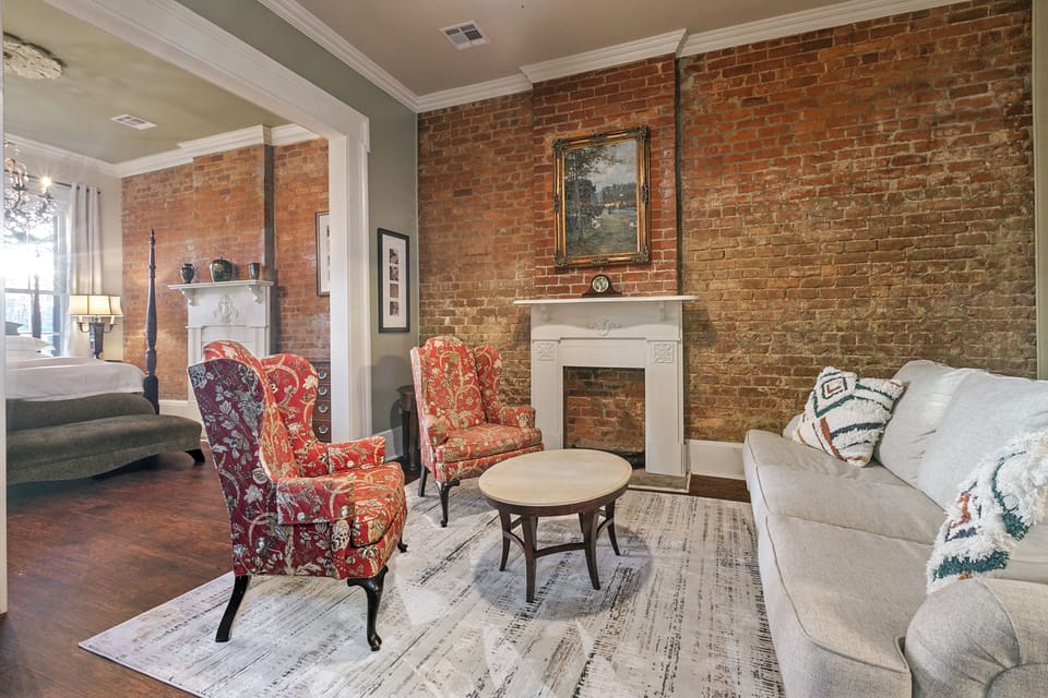 Armstrong's grand living room with a queen sleeper sofa and plenty of natural light