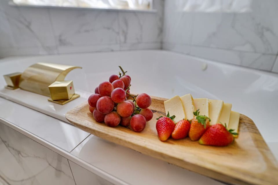 Complimentary candles, robes, or wine & food tray to getaway on your getaway