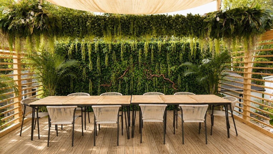 Dine alfresco at the large outdoor table, perfect for relaxed group meals.