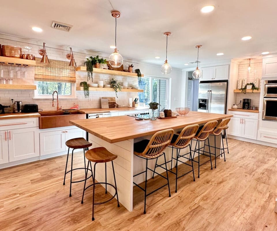 Recently updated kitchen near Tobyhanna State Park, featuring a large island that seats eight and a hibachi-style cooktop.