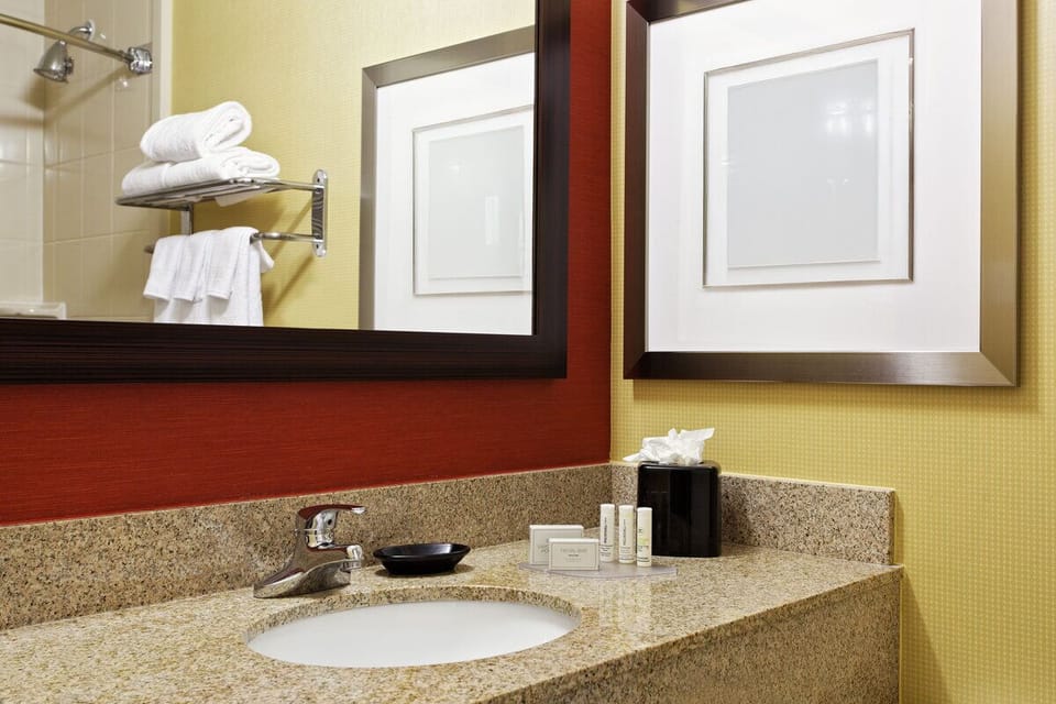 Refresh at the roomy vanity with fluffy towels ready.