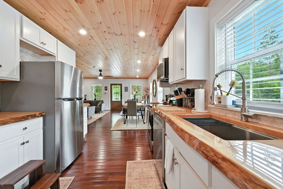 The kitchen showing the live edge counter tops.