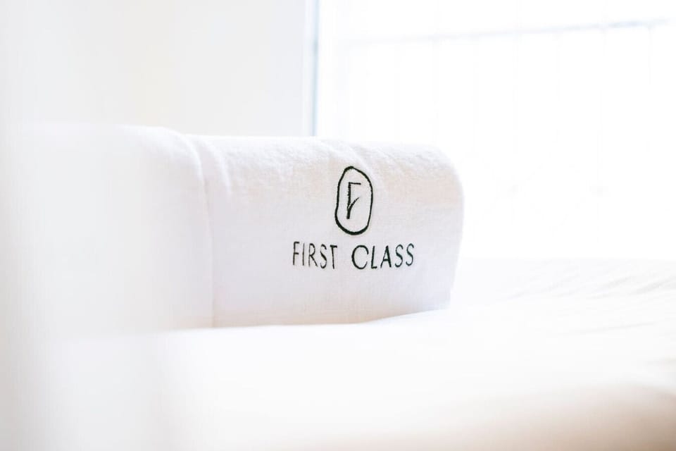 Luxurious Suite: Plush linens and premium amenities, perfect for a rejuvenating getaway!