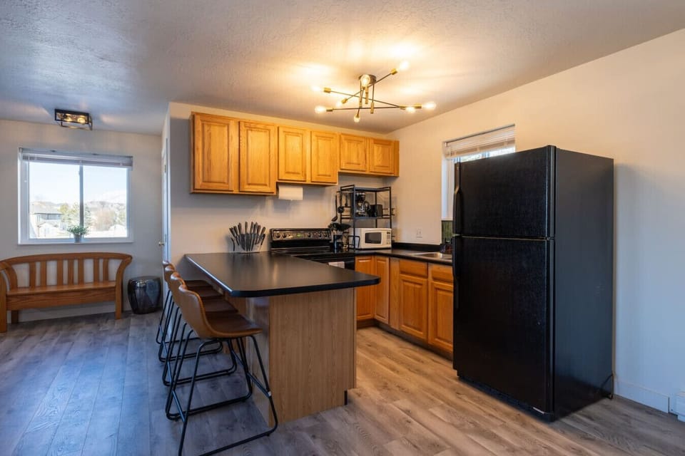 Full kitchen with island seating  for meals made simple