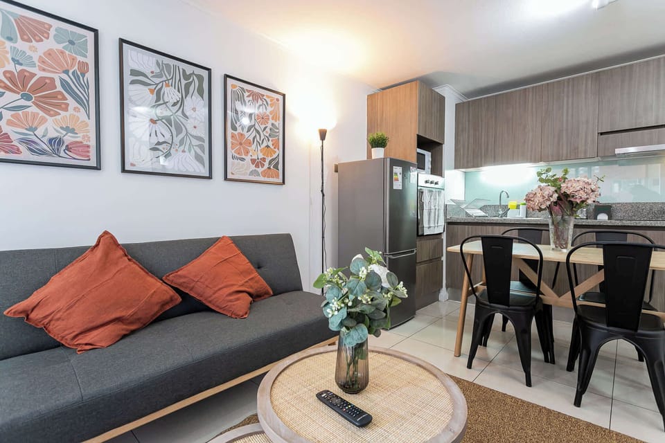 Enjoy a cozy and stylish living space with modern decor, perfect for relaxing after a day of exploring.