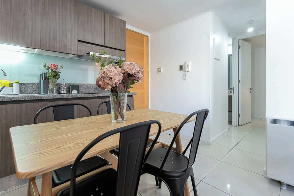 Bright and functional kitchen with modern appliances, perfect for preparing meals during your stay.