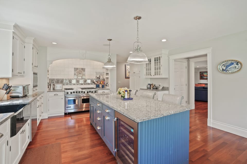 Professional-grade Viking range and Subzero fridge, perfect for island entertaining.