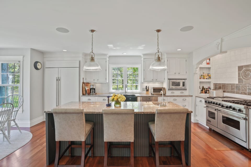 Professional-grade Viking range and Subzero fridge, perfect for island entertaining.