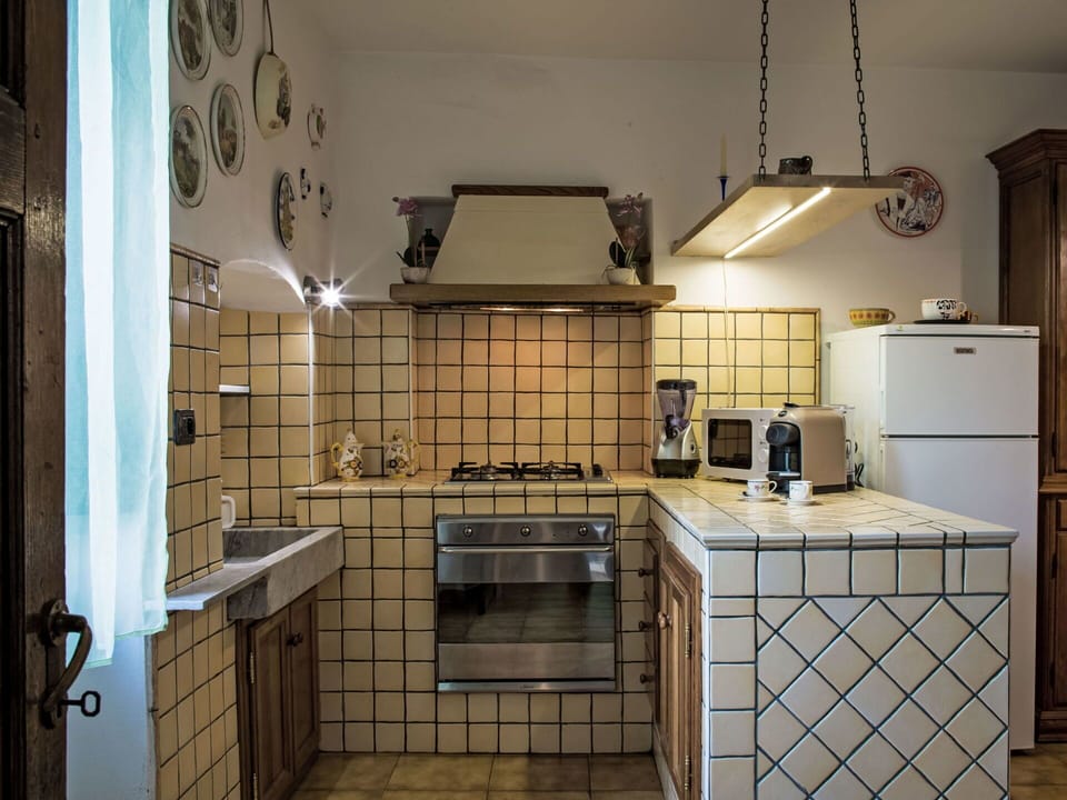 Kitchen, Interior Design, Flooring, Kitchen Appliance, Countertop, Kitchen Stove, Floor, Major Appliance, Ceiling, Room