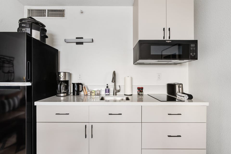 Prepare meals easily in a kitchenette equipped with the essentials.