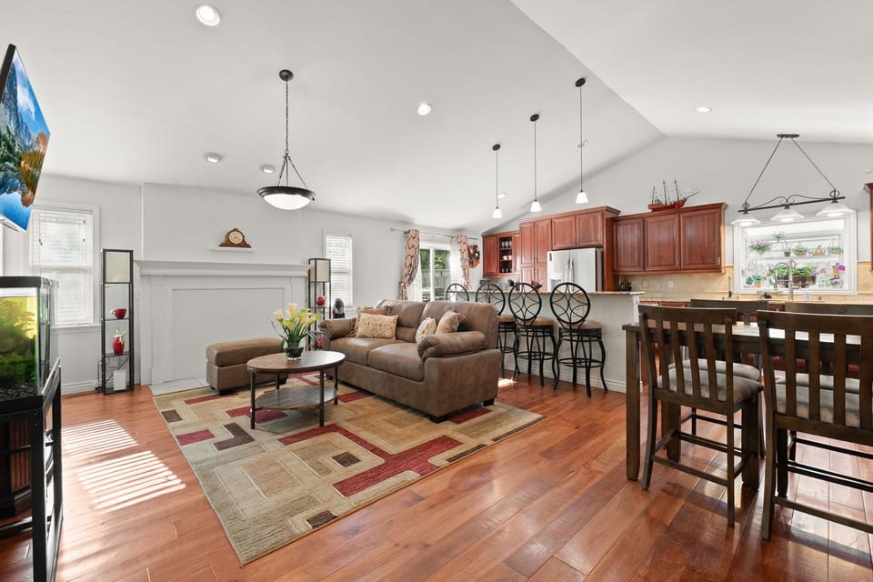 View of living room and kitchen from the front door