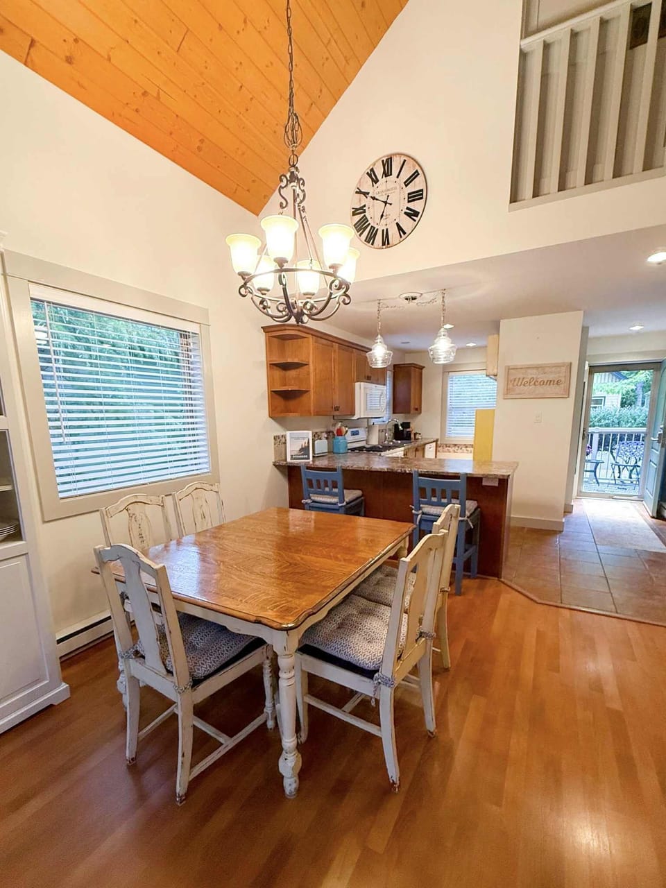 Vaulted ceilings in dining room.