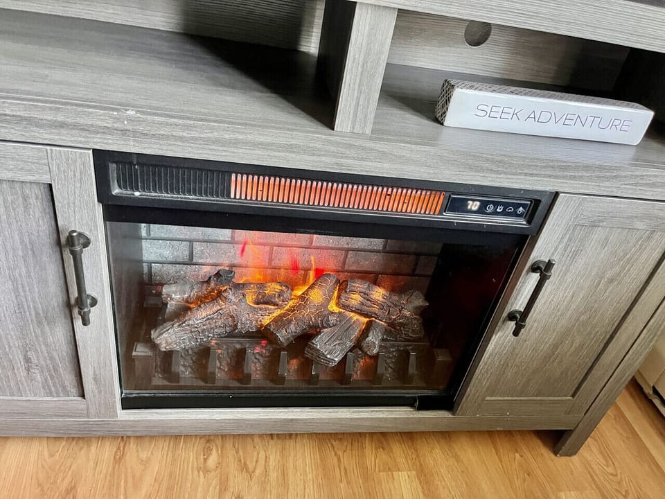 Enjoy lazy mornings in bed with the electric fireplace