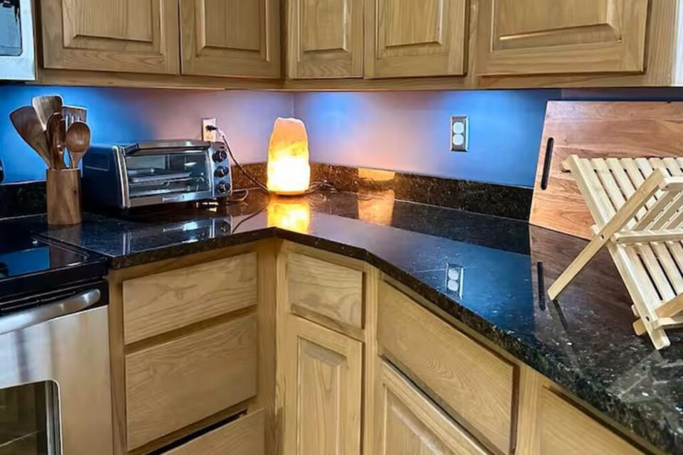 Kitchen.  Granite countertops and under cabinet lights plus everything you need.