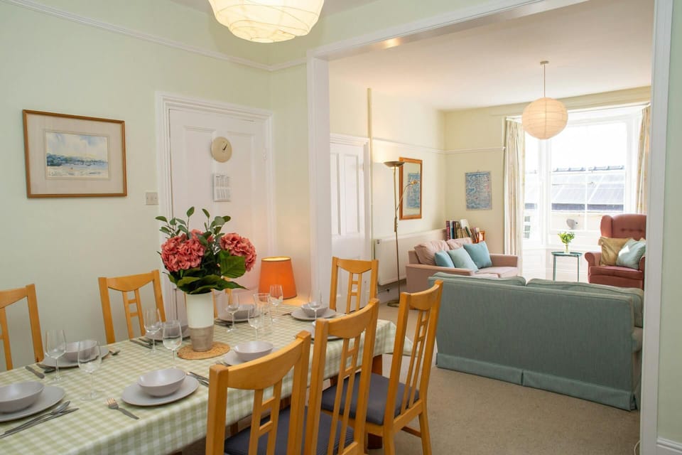 Dining area leading through to living room