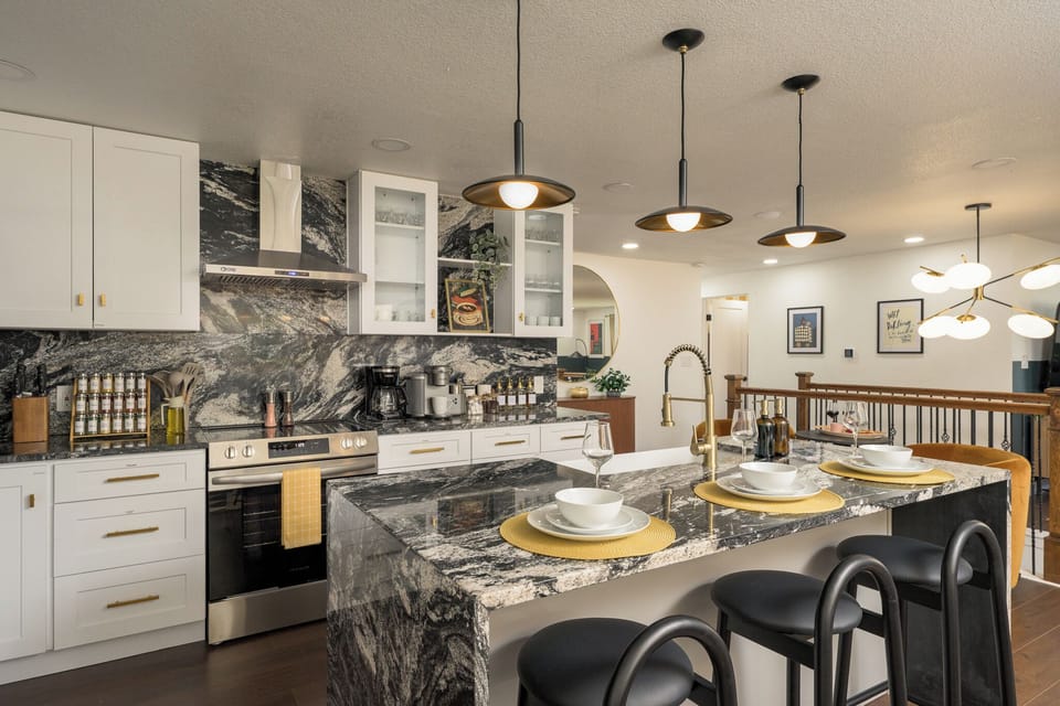 Cook, entertain, and gather in this modern chef’s kitchen featuring upscale finishes, full cookware, and thoughtful design.
