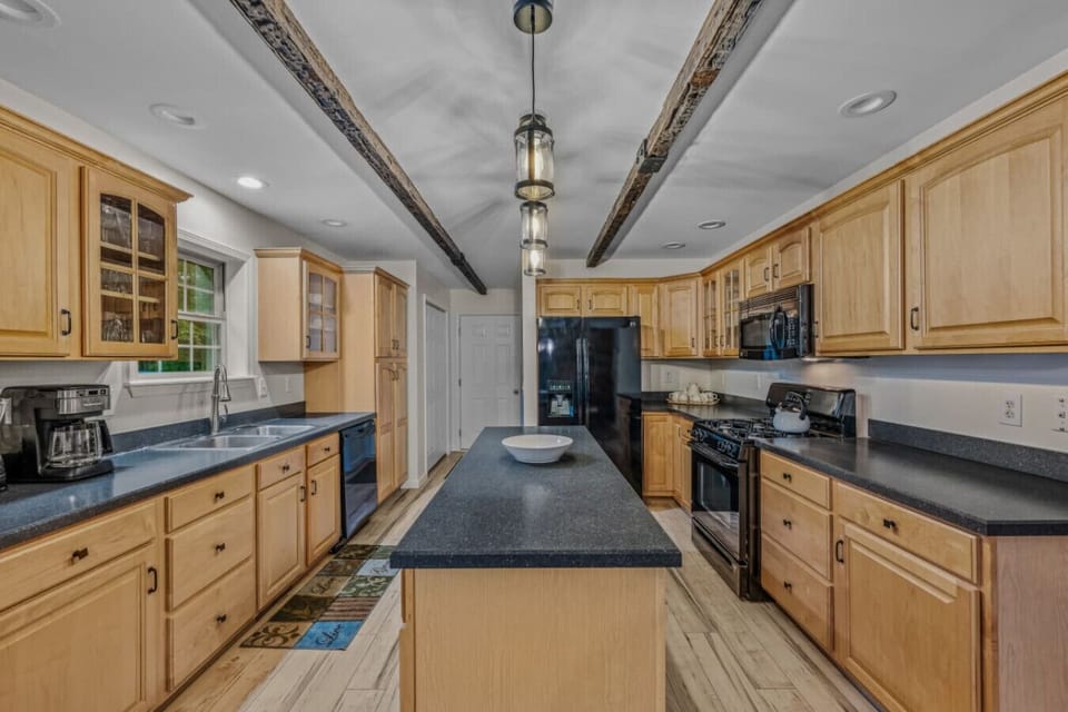 Otter Manor has a large full kitchen, propane stove