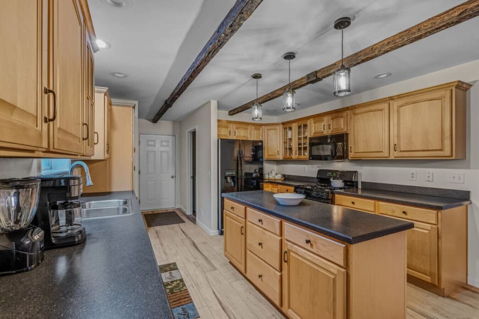 The kitchen has many appliances for guests!