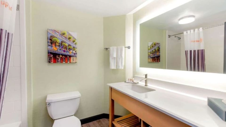 Reset in a spotless bath with roomy counter space.