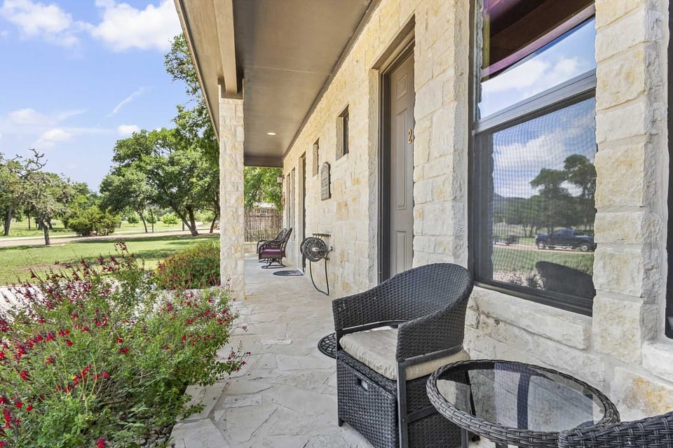 Escape to the tranquility of our charming vacation rental, where comfort meets nature. Enjoy serene mornings on the patio, surrounded by lush greenery and the peaceful ambiance of the countryside.