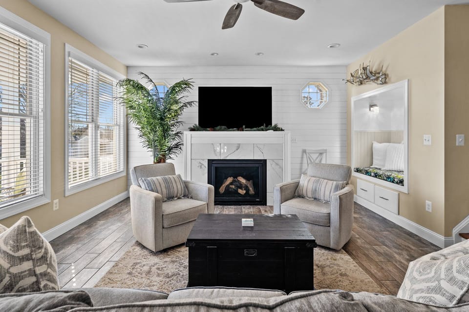Spacious Living Room with Wall to Wall Windows