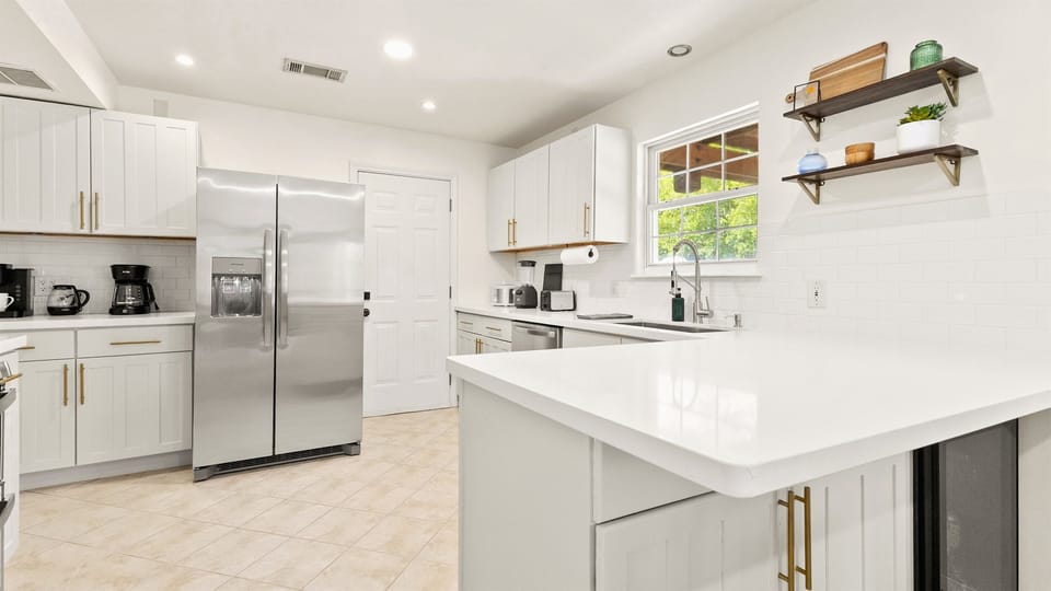 Full kitchen is fully stocked. You could cook a Thanksgiving feast with all this kitchen has to offer!