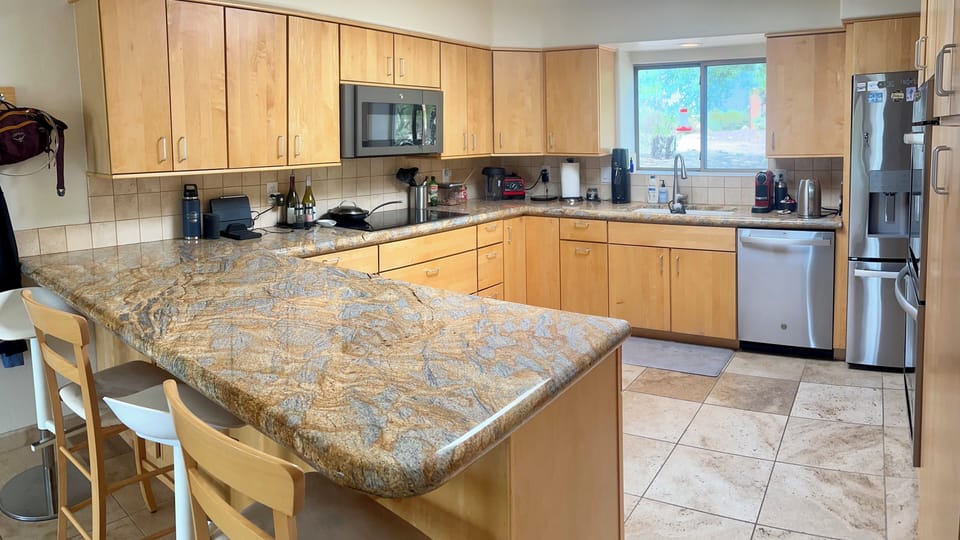 Kitchen with dishwasher and views of the Catalinas