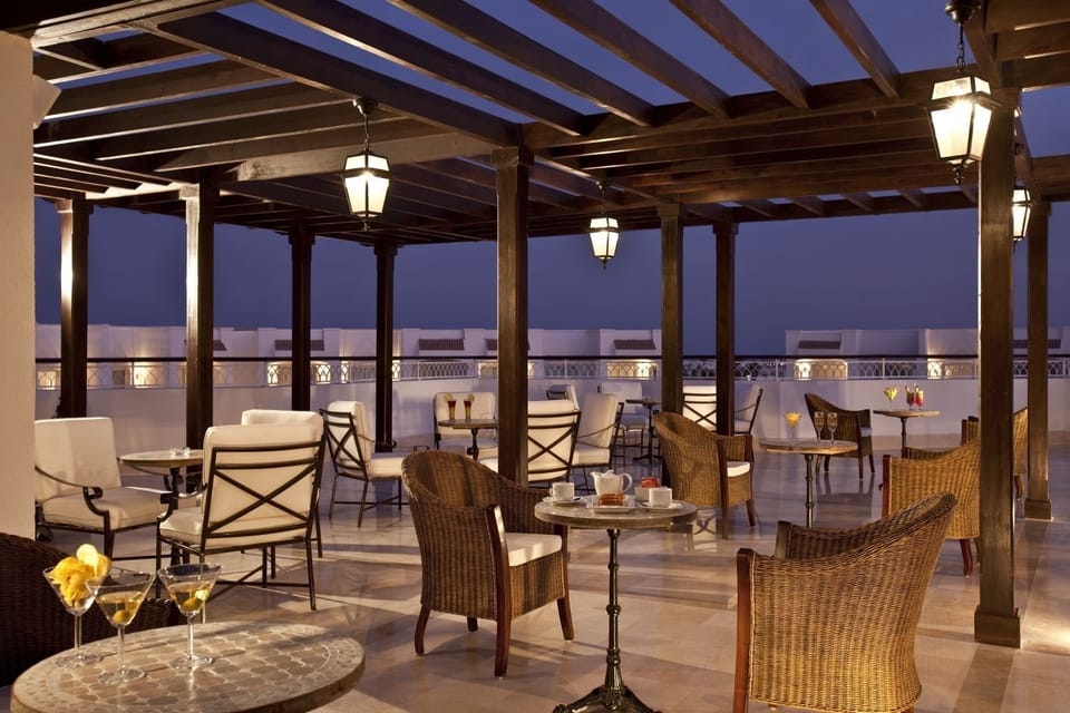 Sip cocktails under lantern light on the breezy open terrace.