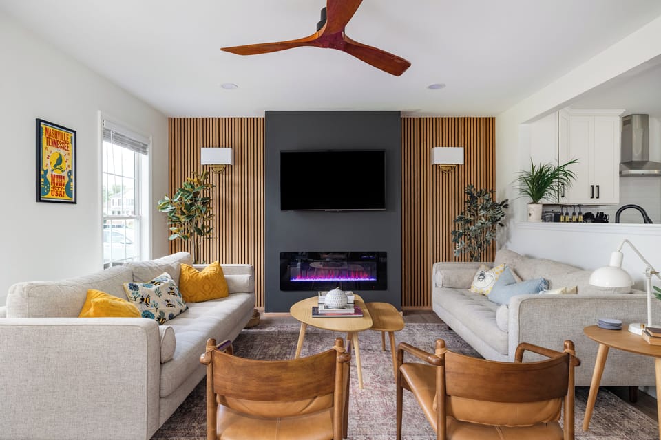 Relax in our living room by the fire while enjoying a TV show.