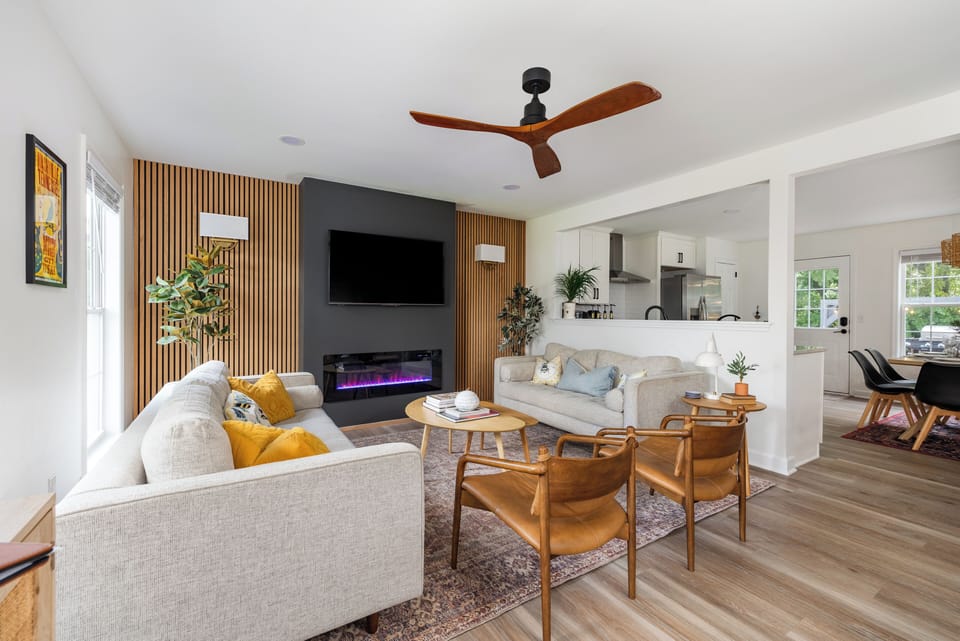 Relax in our living room by the fire while enjoying a TV show.