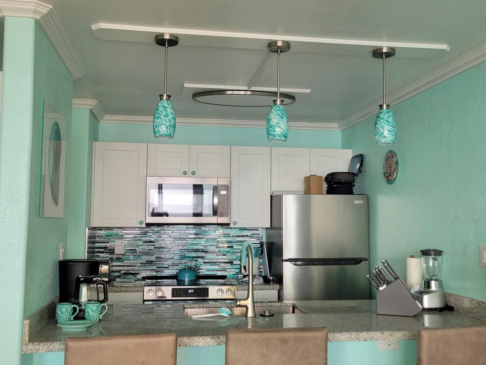 Full-Sized Kitchen with Bar Stools