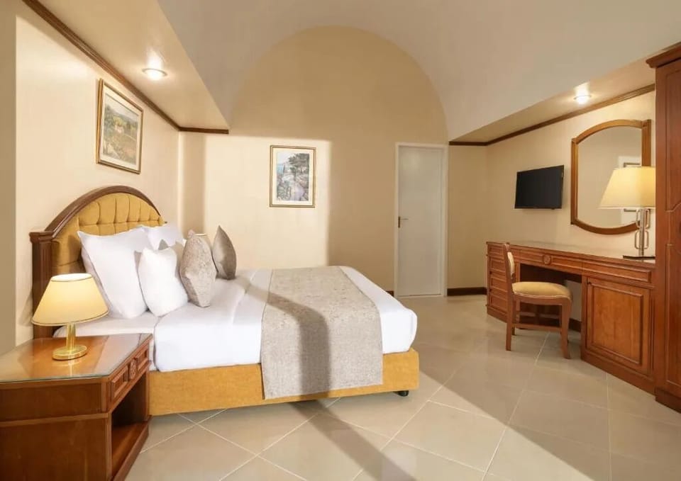 Settle into plush pillows after a day of exploring.