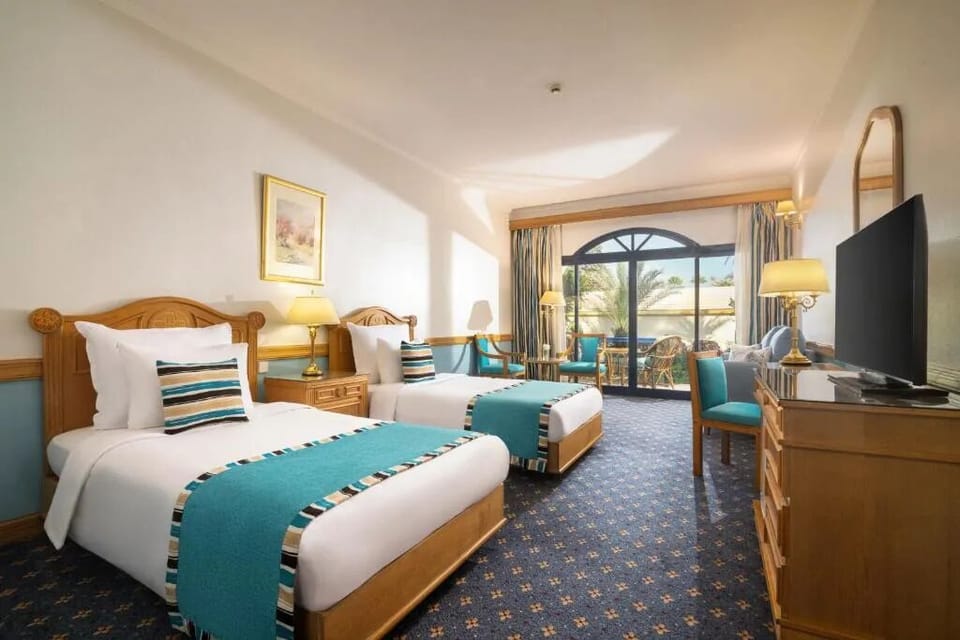 Start your morning with balcony light and airy twin comfort.