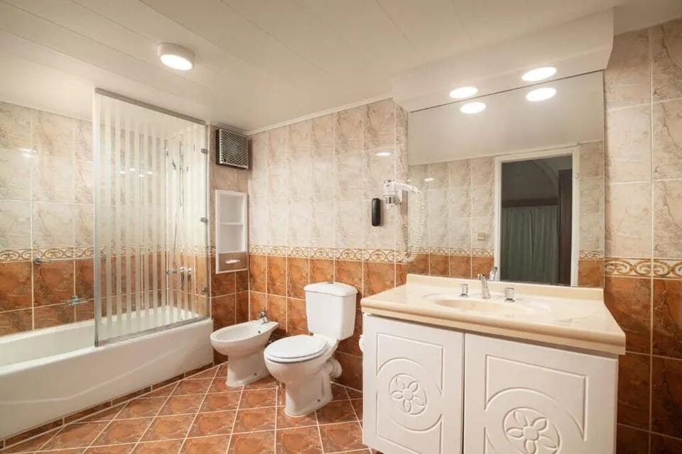 Soothe tired muscles with a full bath and roomy layout.