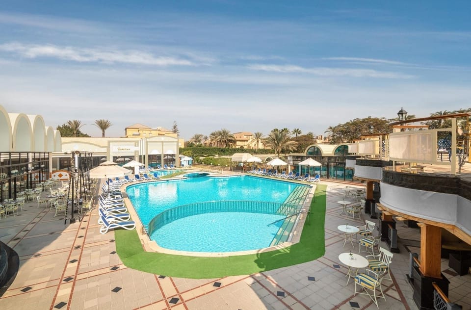 Soak up the day beside a wide, refreshing turquoise pool