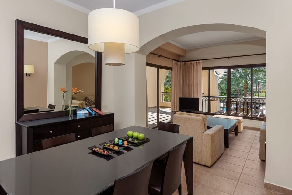 Gather for leisurely meals, then spill out onto the balcony.