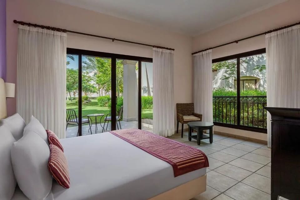 Wake up to sunshine and garden views from bed.
