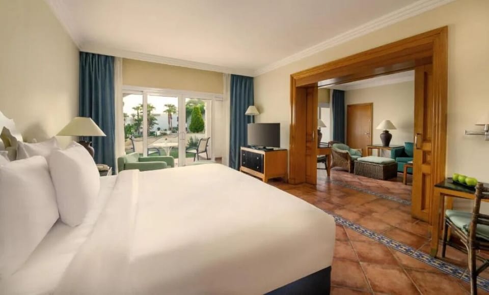 Settle into a spacious suite with cozy lounge seating.