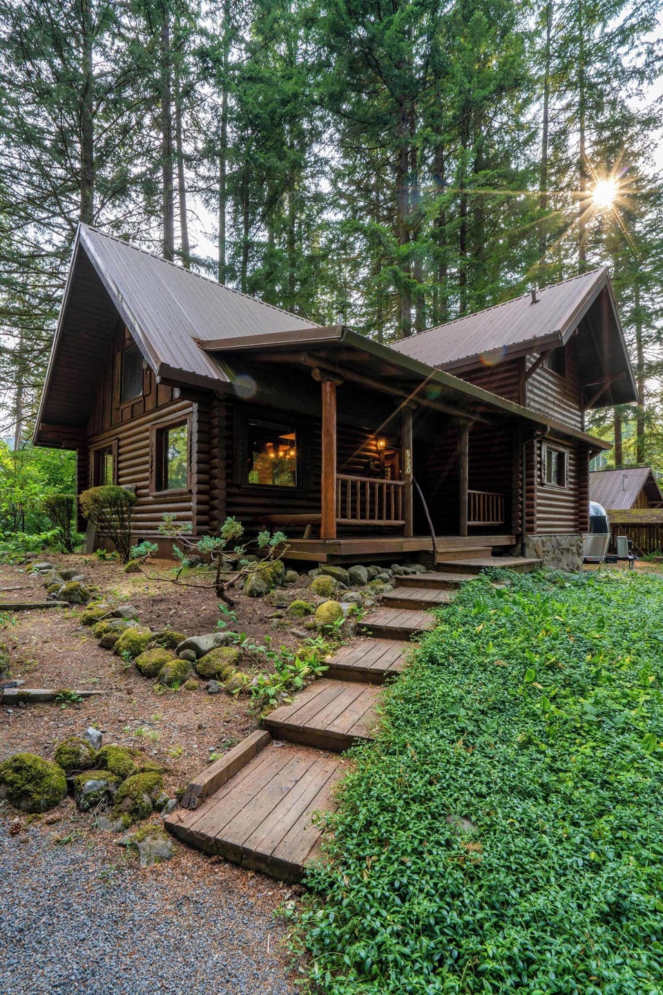 Stone path and covered porch welcome you in.
