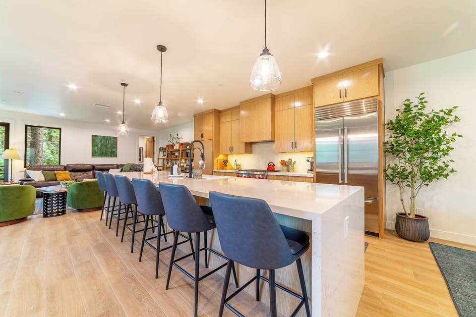 Oversized 14' kitchen island with bar seating for 6 people.