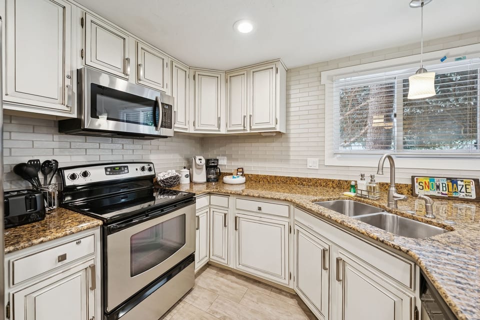Such a cute kitchen, stocked perfectly for your stay